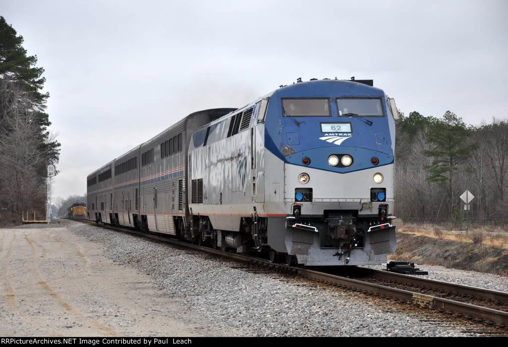 Westbound "Texas Eagle" passes manifest in siding